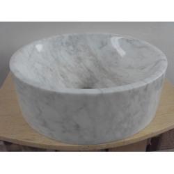 white polsihed round marble sinks